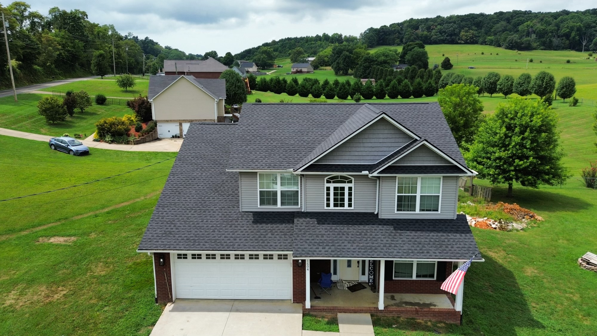 A New Roof for a Talbott Home: A Shingle Roofing Success with GAFs Timberline UHDZ Charcoal Shingles